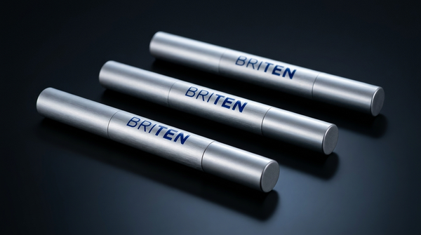 Three BRITEN whitening gel refill pens on a dark surface