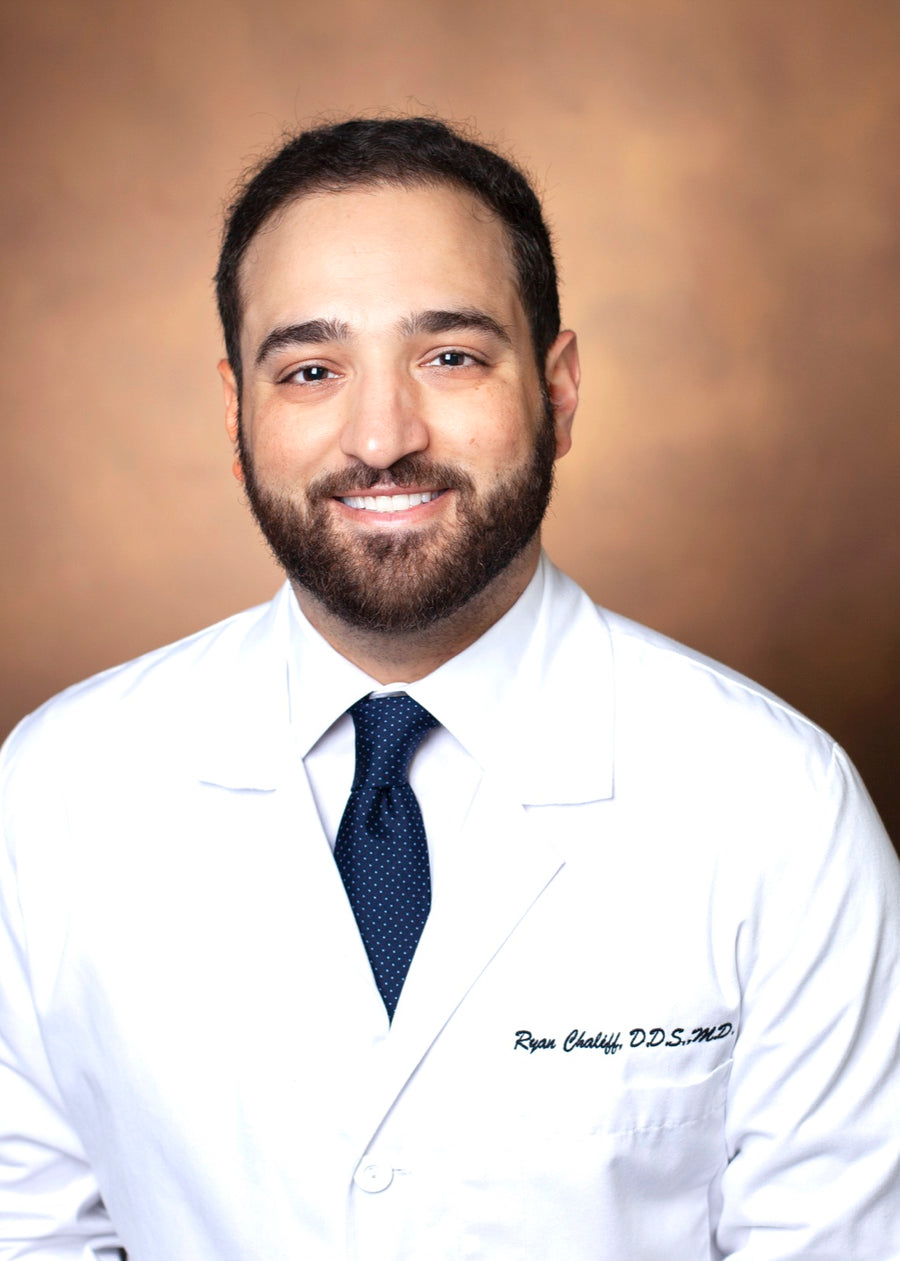 Dr. Ryan Chaliff, DDS, MD, practicing dentist and co-founder of BRITEN, in a white coat