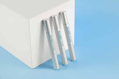 Teeth whitening gel pen refill close-up showing brush tip applicator